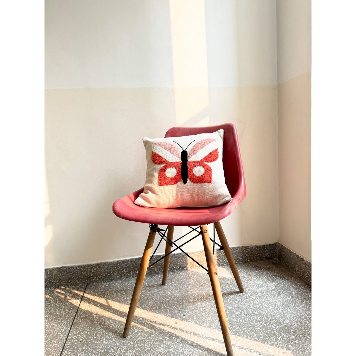 Butterfly cushion pink, soft cotton knitted with punchneedle embroidery.